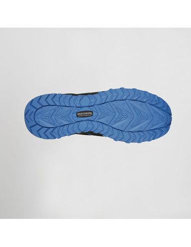 Detalle de suela antideslizante y empeine textil en calzado Skechers Puxal